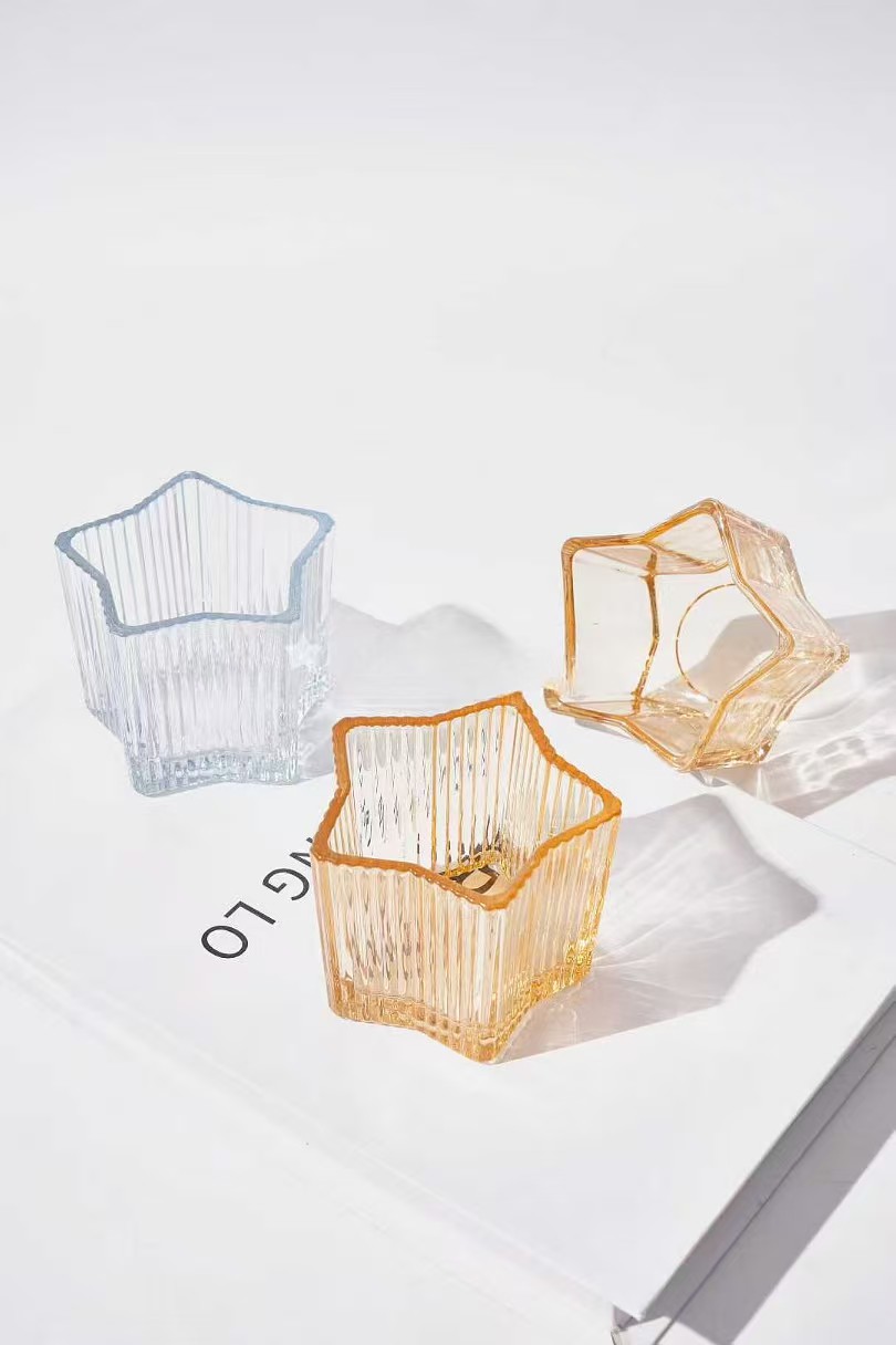 स्टार के आकार का ग्लास मोमबत्ती धारक